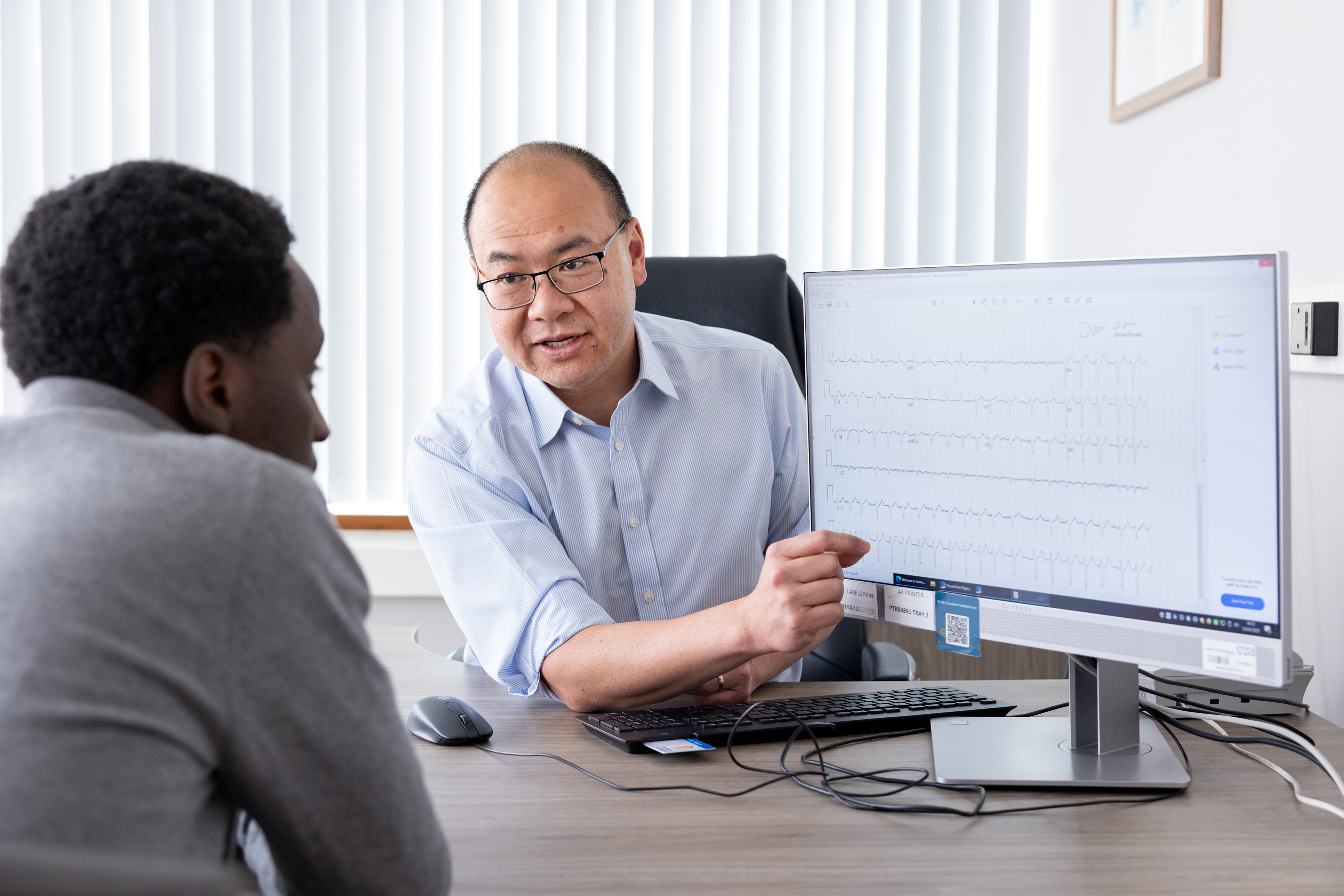Medical consultation at desk
